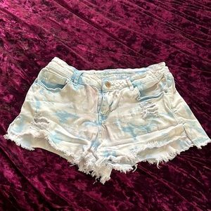 Mid to high waist distressed jean shorts